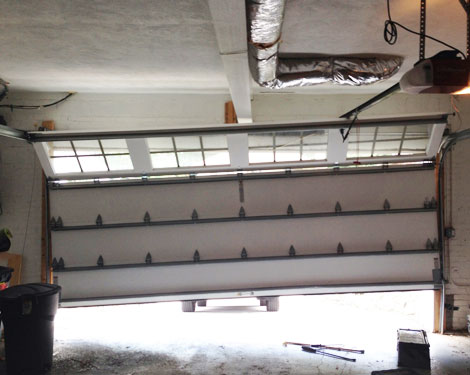 Off tracks garage door repair